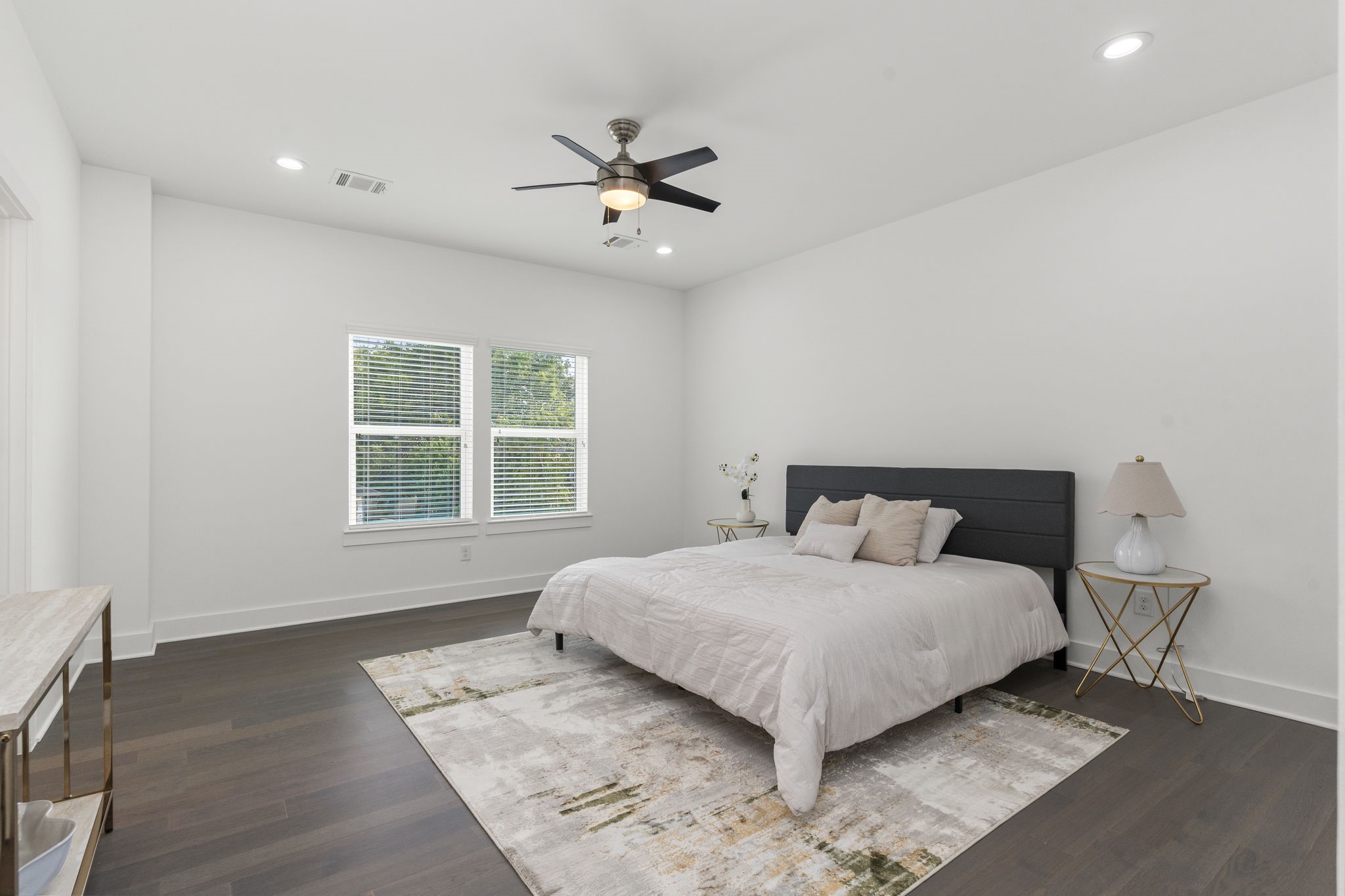 1517 Egypt Street Houston, TX 77009 - Photo 32 of 46 a bedroom with a large bed and a window