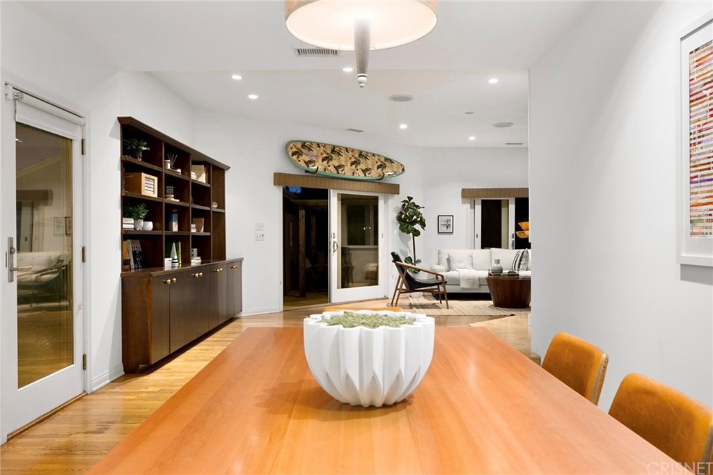 831 Appleby Street Venice, CA 90291 - Photo 11 of 39 a living room with furniture and a chandelier