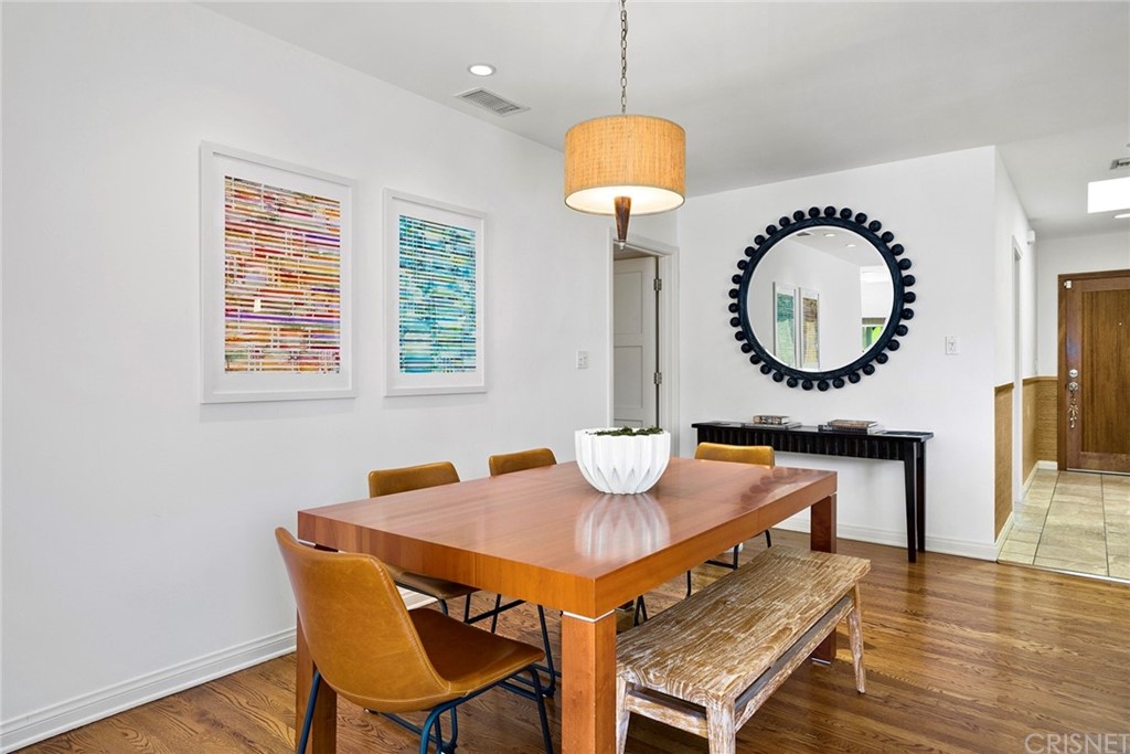 831 Appleby Street Venice, CA 90291 - Photo 12 of 39 a dining room with wooden floor a chandelier