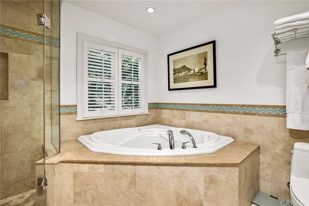 831 Appleby Street Venice, CA 90291 - Photo 26 of 39 a white bath tub sitting next to a window