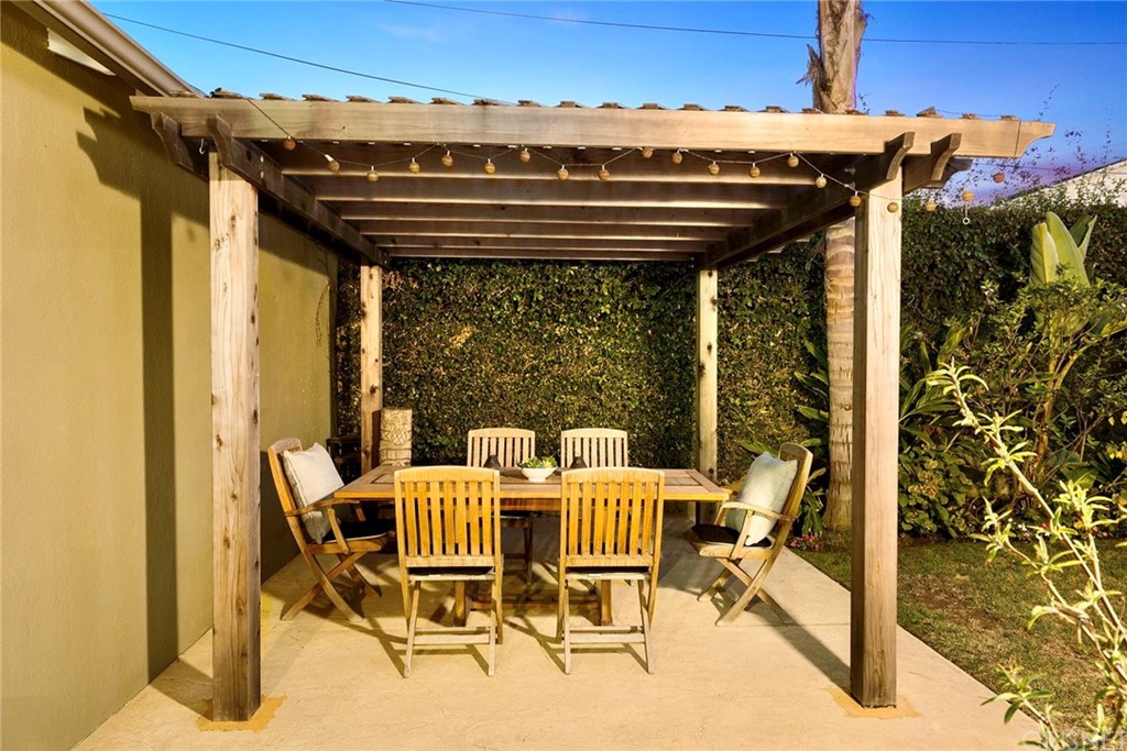 831 Appleby Street Venice, CA 90291 - Photo 33 of 39 a view of patio with table and chairs and potted plants