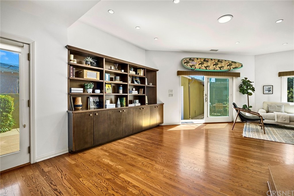 831 Appleby Street Venice, CA 90291 - Photo 8 of 39 a view of an empty room with window and wooden floor