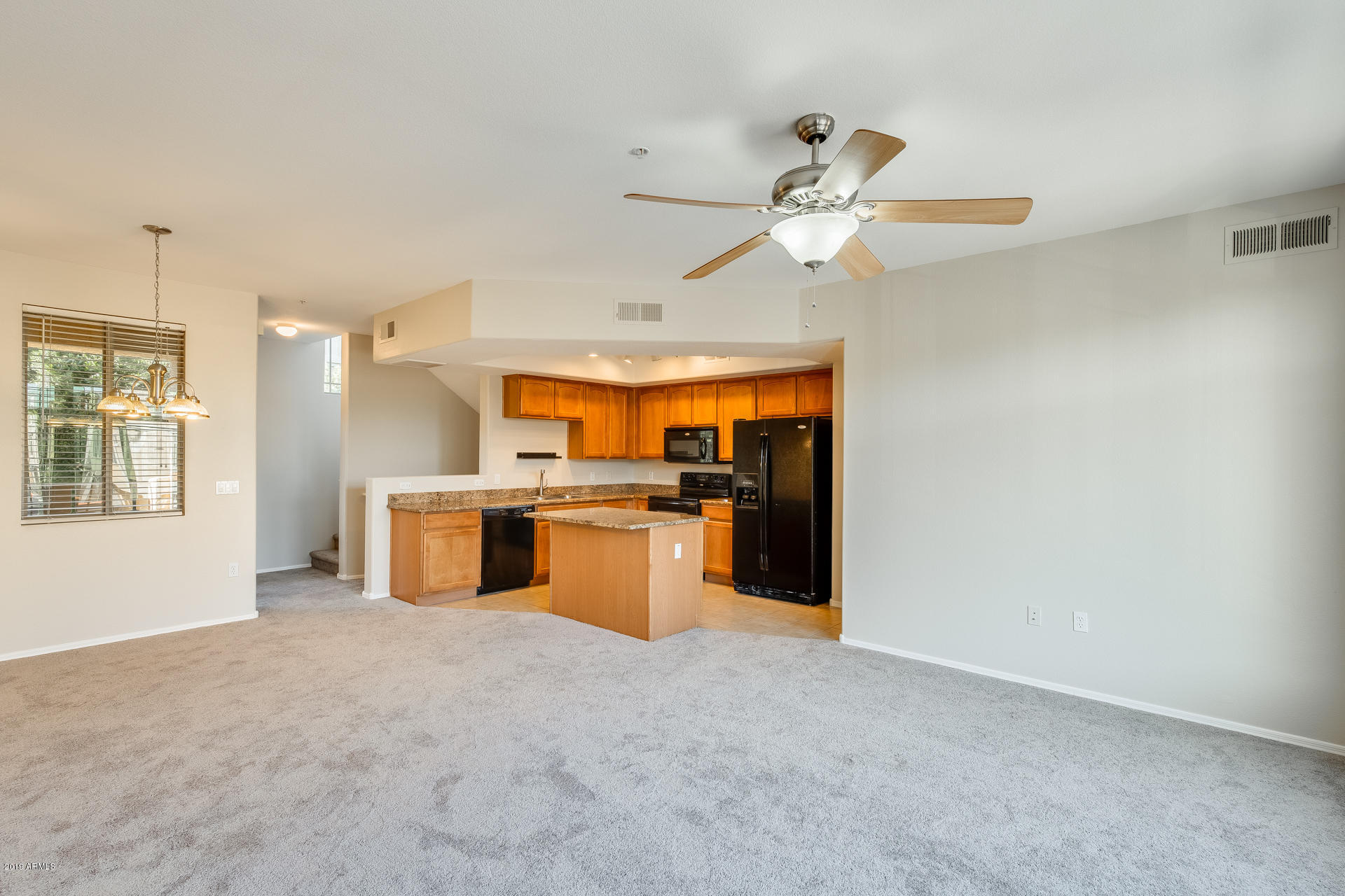2401 East Rio Salado Parkway, Unit 1124 Tempe, AZ 85288 - Photo 16 of 32 a view of a kitchen with a sink and a kitchen view