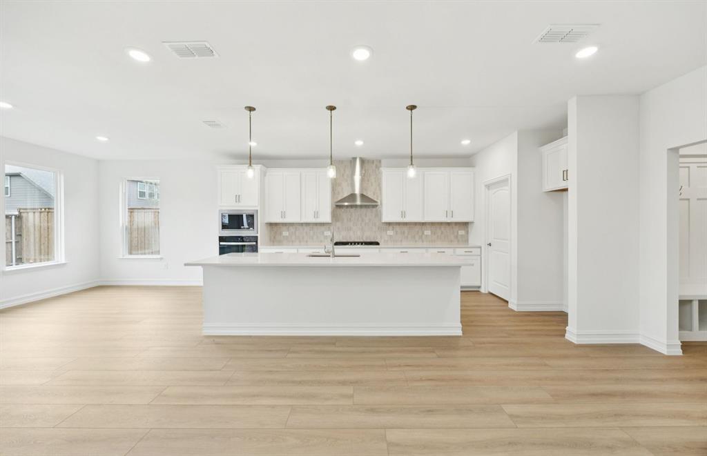 11149 Roxburgh Road Fort Worth, TX 76052 - Photo 12 of 23 *Floorplan representation, not actual home - Spacious kitchen with eat-in bartop island