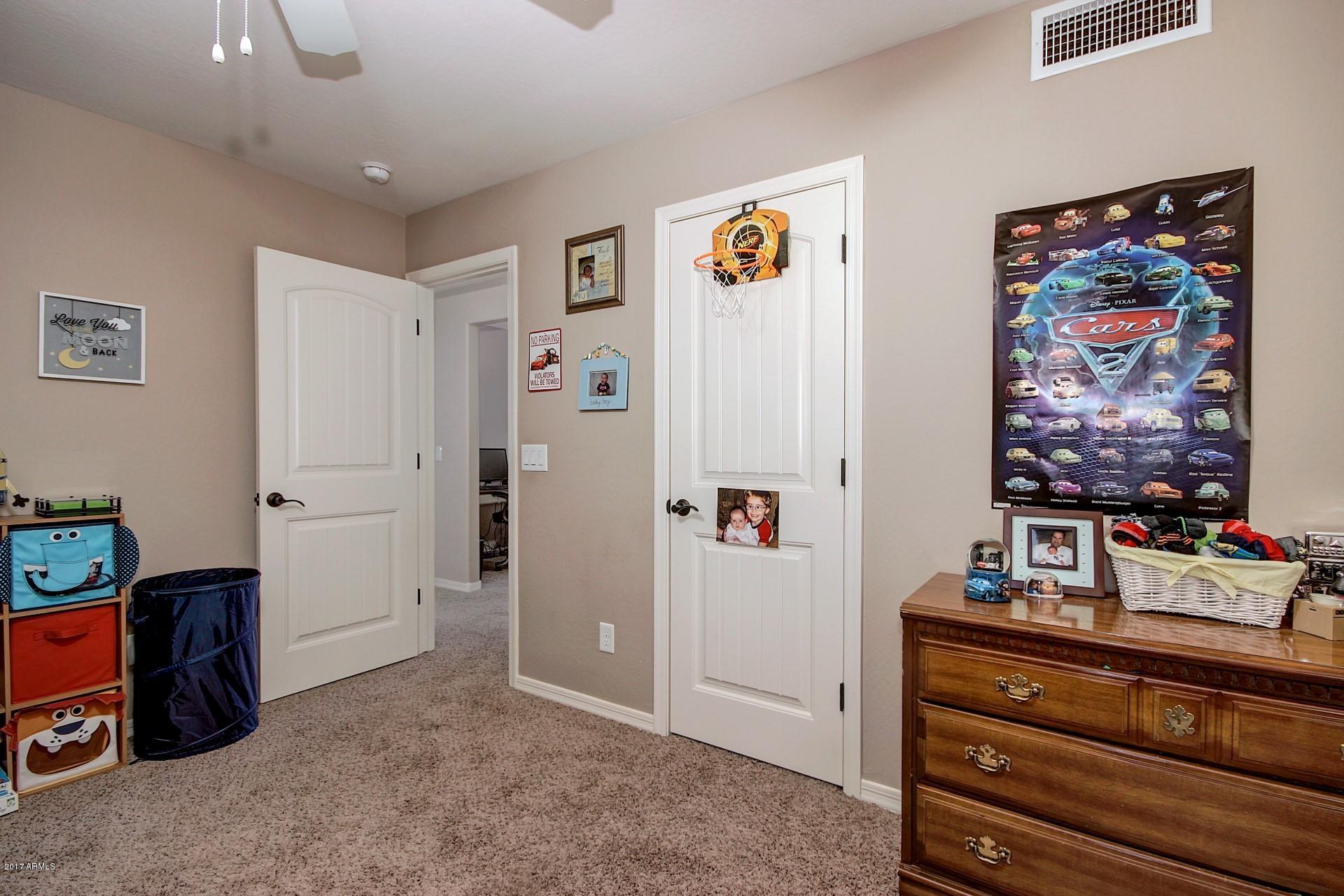 18263 West Hatcher Road Waddell, AZ 85355 - Photo 28 of 32 RM2 closet-Hatcher (36)