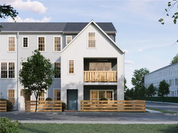 front view of a house with a small yard