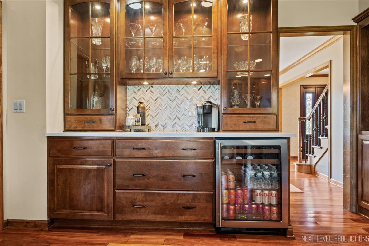 87 Hawkins Circle Wheaton, IL 60189 - Photo 14 of 42 a view of front door with wooden floor