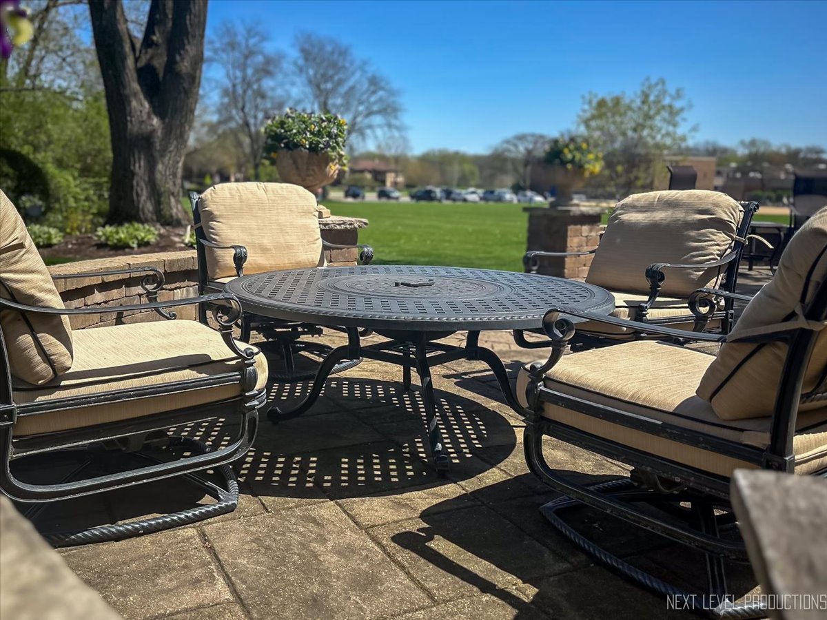 87 Hawkins Circle Wheaton, IL 60189 - Photo 37 of 42 a backyard of a house with table and chairs