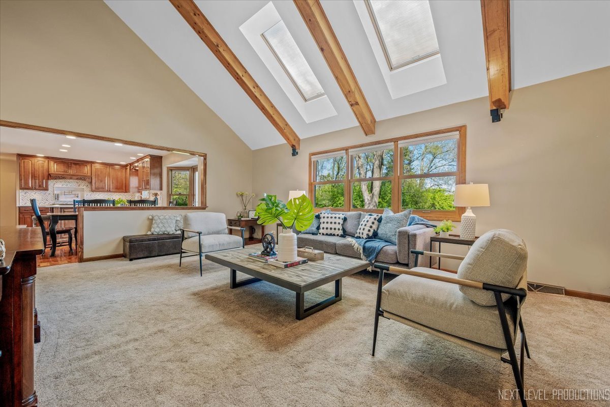 87 Hawkins Circle Wheaton, IL 60189 - Photo 10 of 42 a living room with furniture and a large window