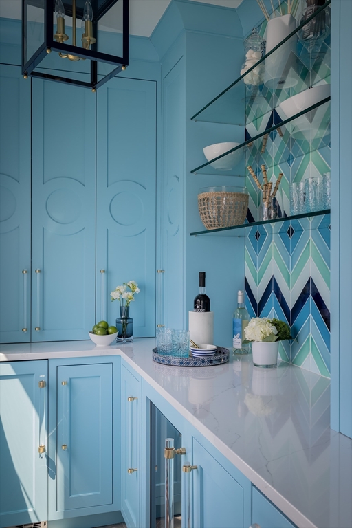353 Beach Avenue Hull, MA 02045 - Photo 11 of 30 a kitchen with a cabinets and a table