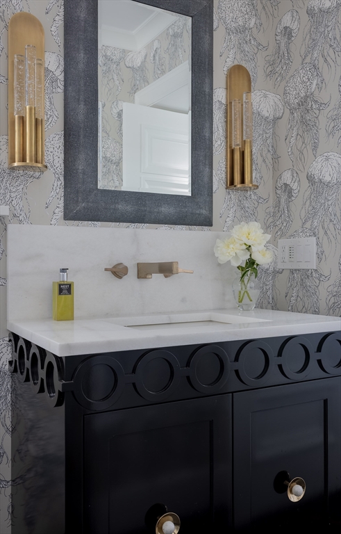 353 Beach Avenue Hull, MA 02045 - Photo 14 of 30 a bathroom with a sink and a mirror