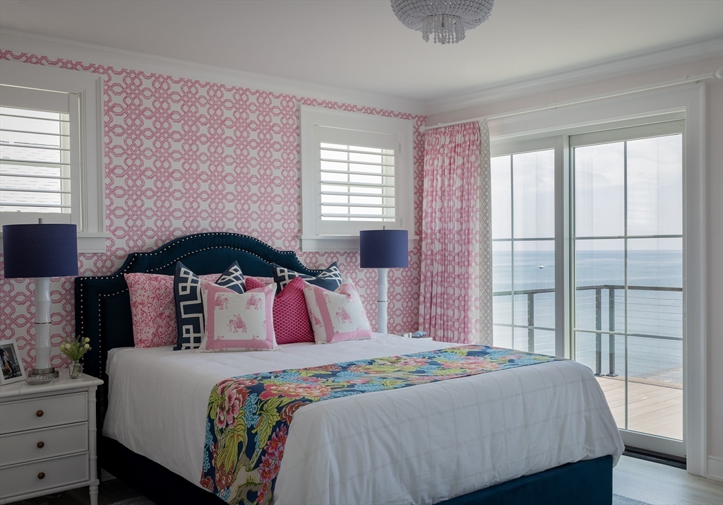 353 Beach Avenue Hull, MA 02045 - Photo 17 of 30 a bedroom with a bed and a window