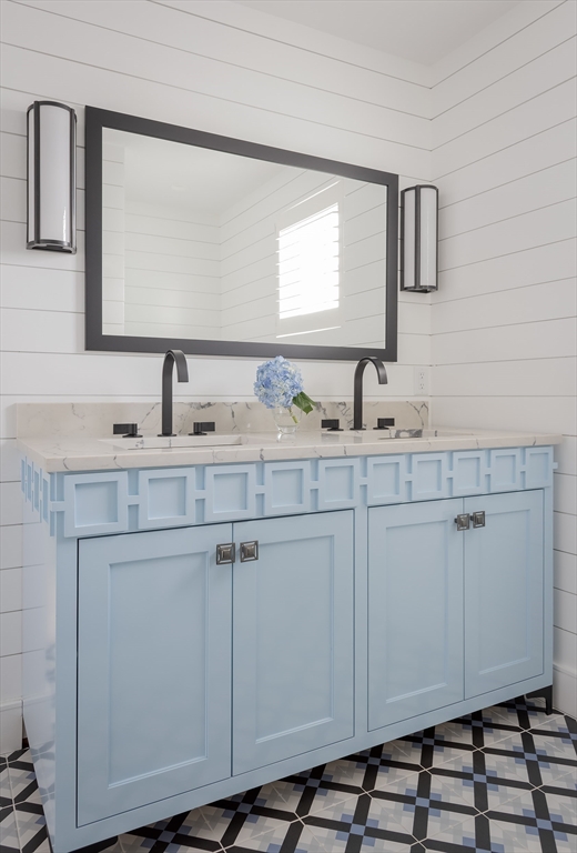 353 Beach Avenue Hull, MA 02045 - Photo 20 of 30 a bathroom with a sink and a mirror