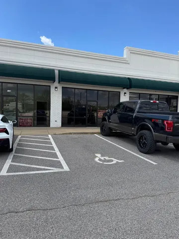 a car parked in front of a building