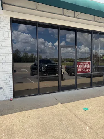 a view of a street with an outdoor space