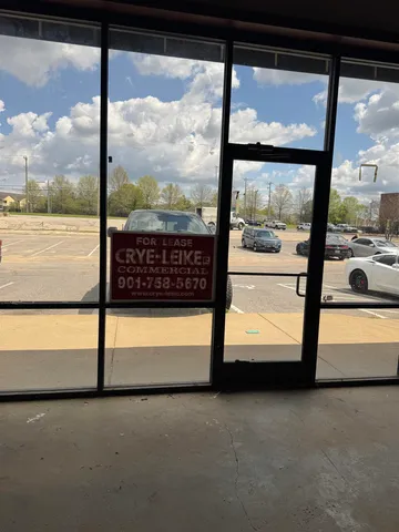 a view of a glass door with an outdoor space