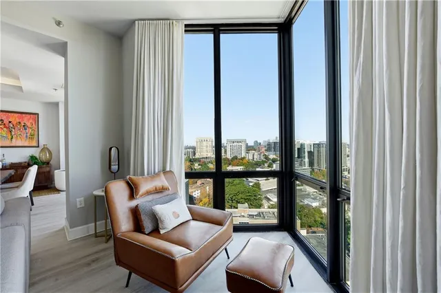 a living room with furniture and a window