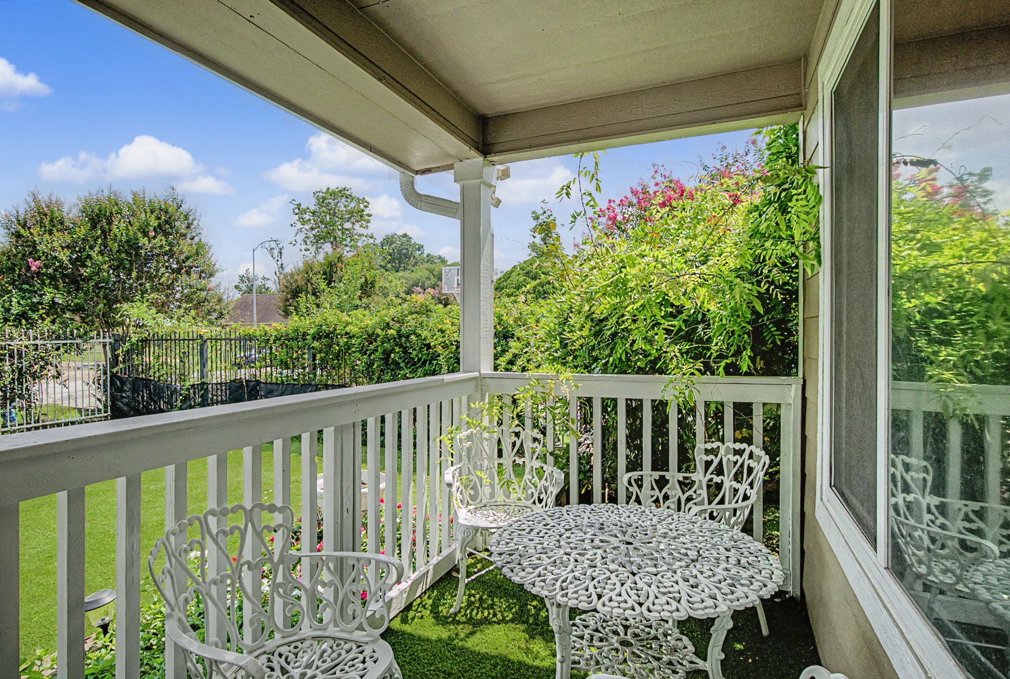 10034 Alfred Lane Houston, TX 77041 - Photo 10 of 50 Designed for relaxation and entertaining, this inviting outdoor space blends comfort, shade, and timeless charm.