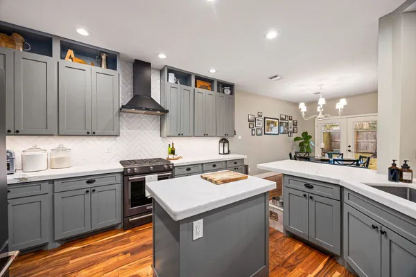 a kitchen with a sink and cabinets