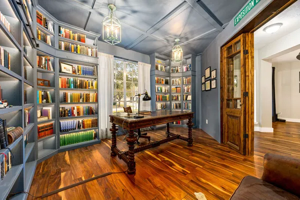 a view of a livingroom with furniture and toys