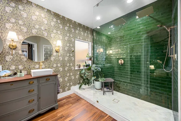 a bathroom with a sink and mirror