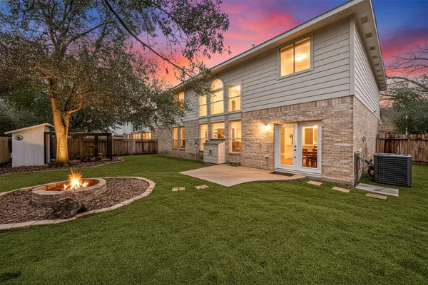 a view of a backyard with a garden