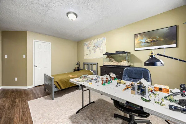 a view of a workspace with furniture