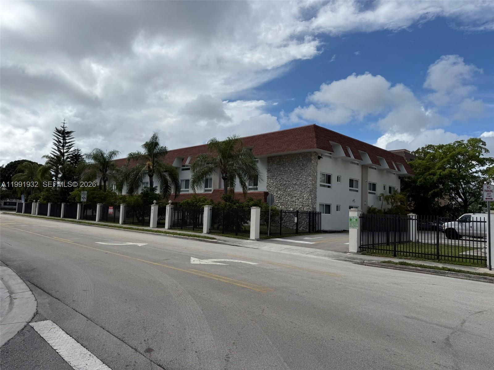 7251 Southwest 82nd Street, Unit 15 Miami, FL 33143 - Photo 12 of 15 a view of a house with a street