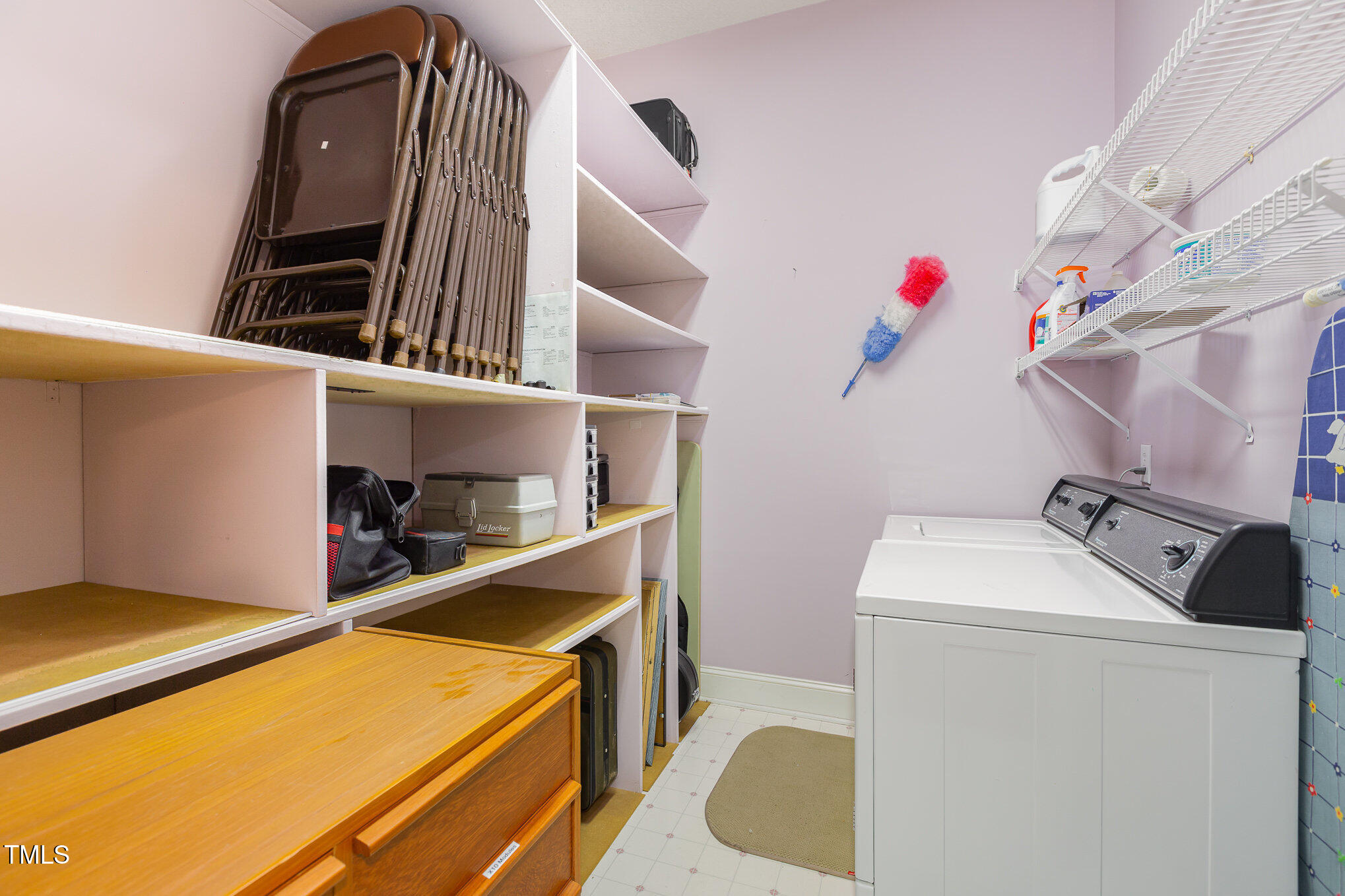 1508 High Holly Lane Raleigh, NC 27614 - Photo 35 of 46 a utility room with dryer and washer