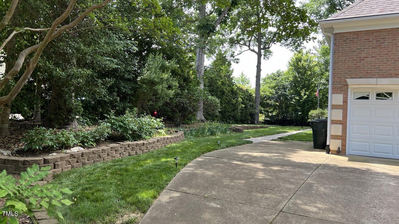 1508 High Holly Lane Raleigh, NC 27614 - Photo 36 of 46 a view of backyard with green space