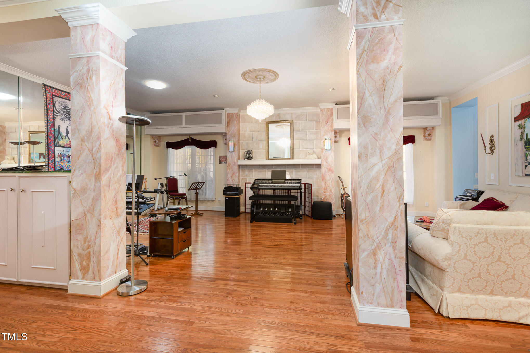 1508 High Holly Lane Raleigh, NC 27614 - Photo 8 of 46 a view of a living room kitchen and a wooden floor