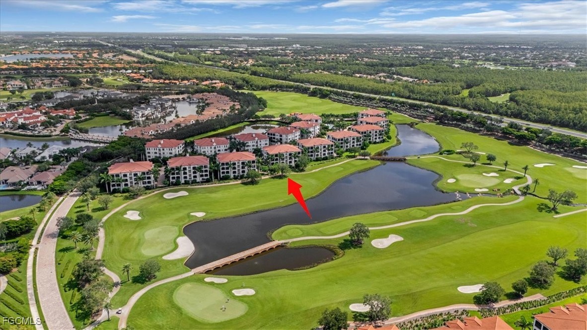 16432 Carrara Way, Unit 101 Naples, FL 34110 - Photo 1 of 50 an aerial view of swimming pool