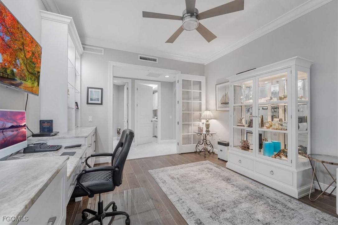 16432 Carrara Way, Unit 101 Naples, FL 34110 - Photo 24 of 50 a bedroom with furniture and a window