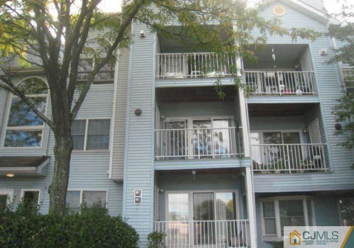 123 Edpas Road New Brunswick, NJ 08901 - Photo 1 of 9 a front view of a house with a balcony