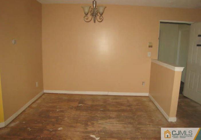123 Edpas Road New Brunswick, NJ 08901 - Photo 5 of 9 a view of a room with wooden floor