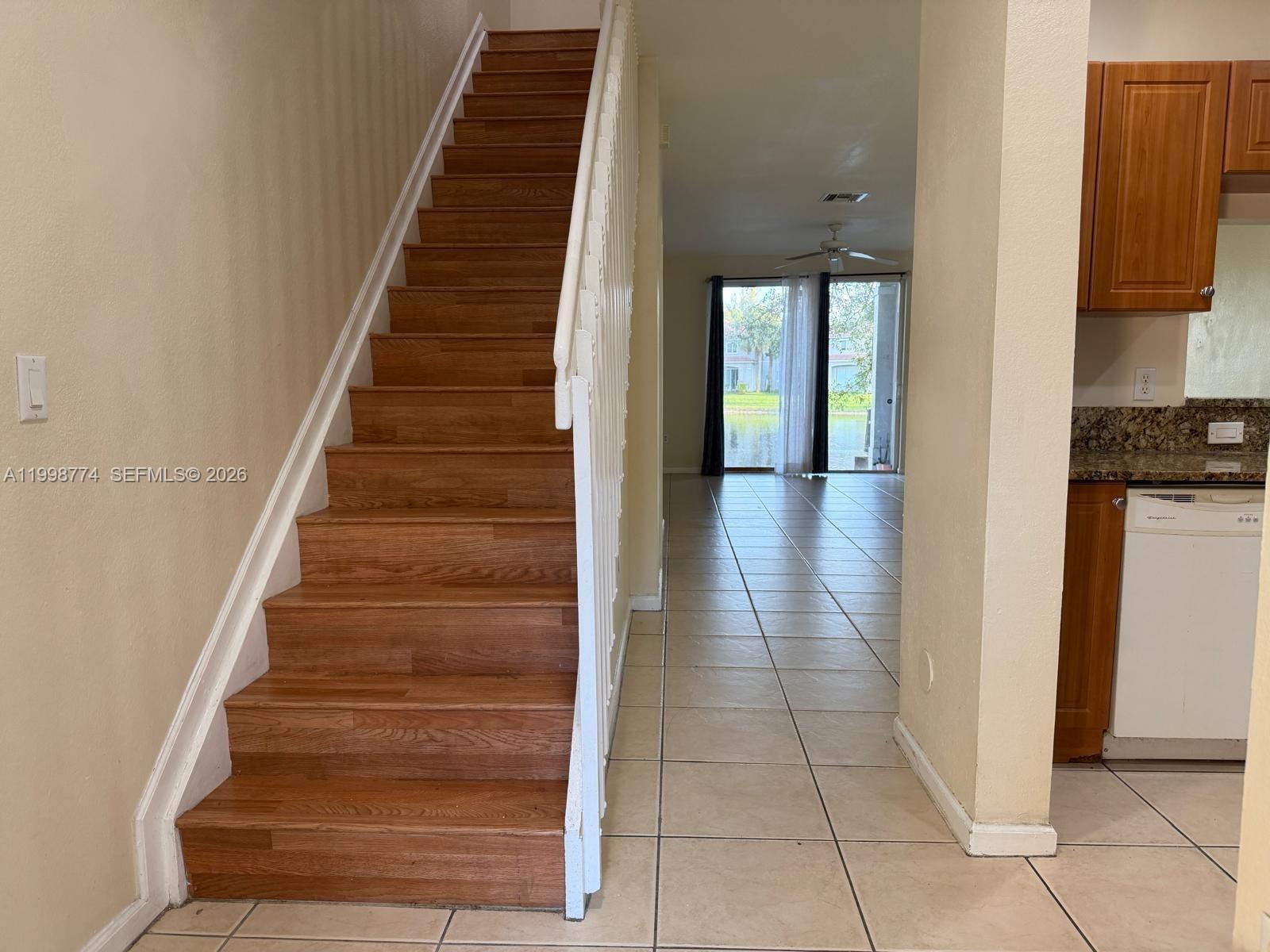 8246 Southwest 27th Street, Unit 103 Miramar, FL 33025 - Photo 2 of 17 a view of entryway and hall with wooden floor