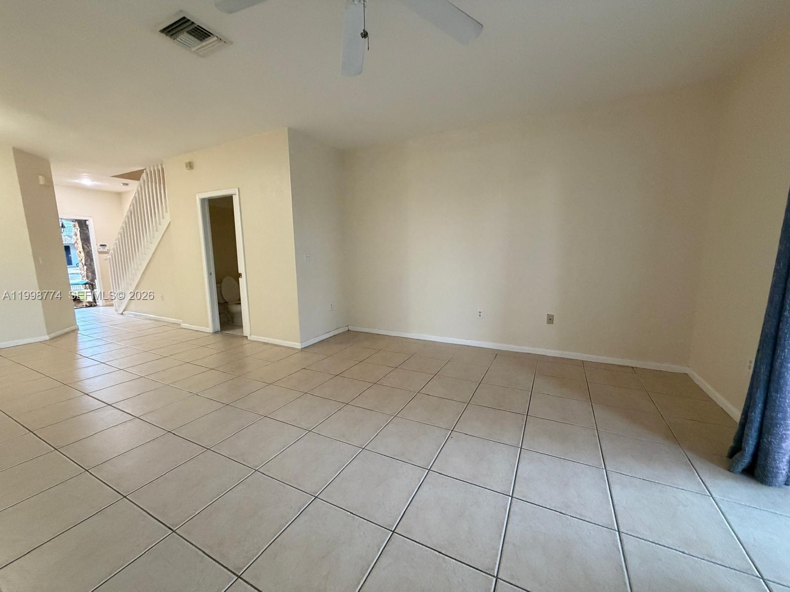8246 Southwest 27th Street, Unit 103 Miramar, FL 33025 - Photo 8 of 17 a view of an empty room