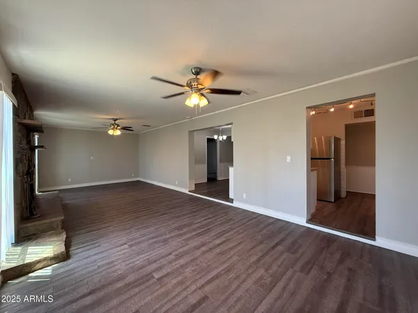 a view of a hallway with stairs