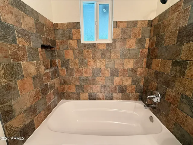 a bathroom with a toilet and a sink