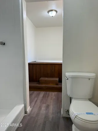 a bathroom with a sink and toilet