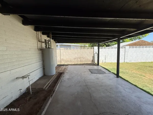 a view of a backyard of a house