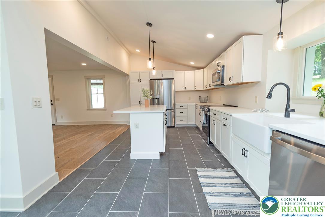 72 Allegheny Road Mount Bethel, PA 18343 - Photo 10 of 72 A chef's dream kitchen offers a convenient center island and ample cabinetry for culinary pursuits.