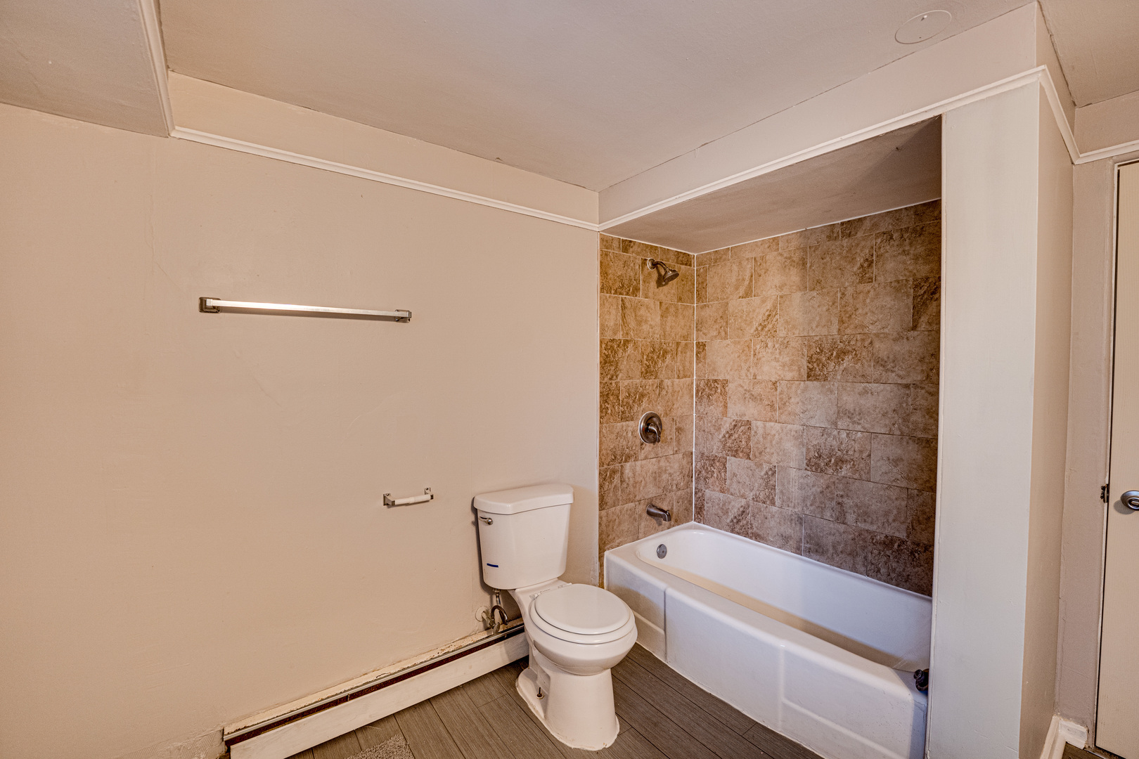 3235 West 157th Street Markham, IL 60428 - Photo 16 of 21 a bathroom with a shower a toilet and a bathtub