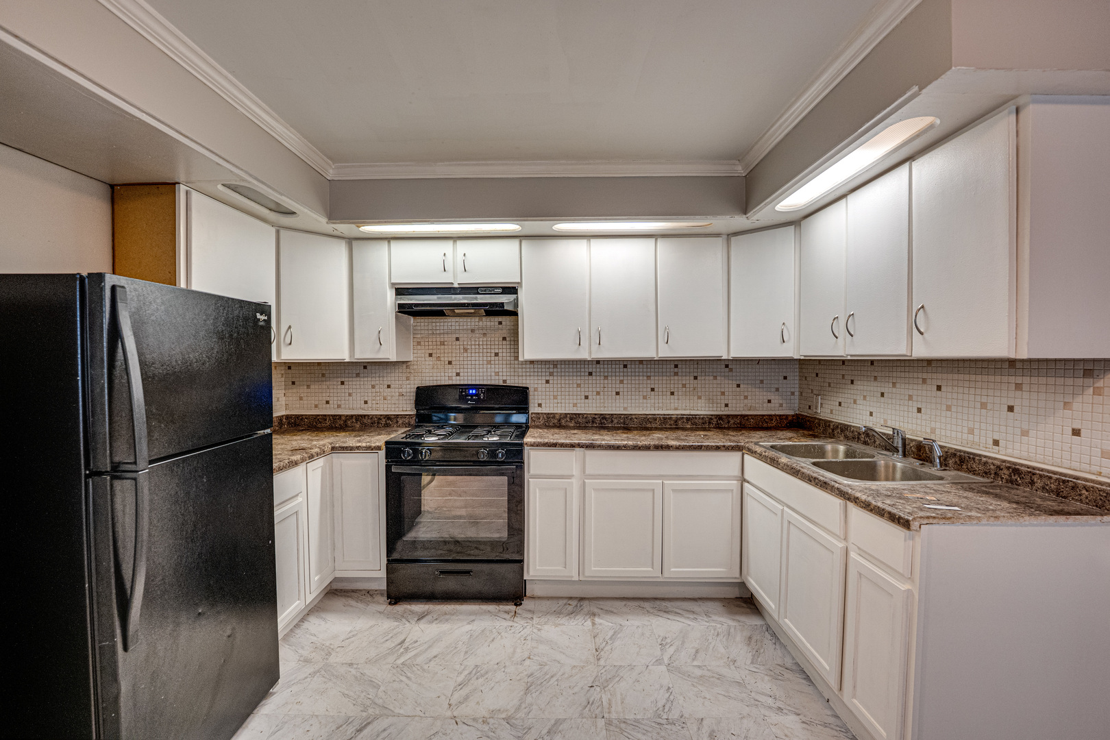 3235 West 157th Street Markham, IL 60428 - Photo 4 of 21 a kitchen with a refrigerator sink and cabinets