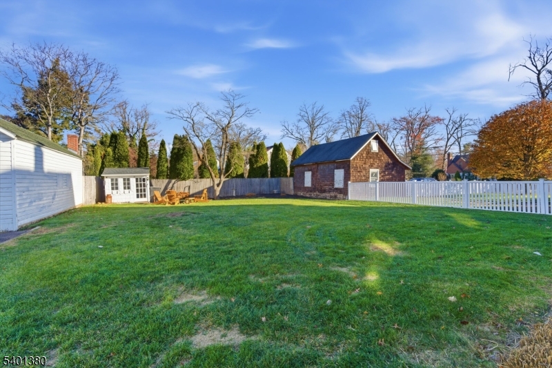 107 Chestnut Street Bound Brook, NJ 08805 - Photo 20 of 24 a view of an house with backyard space and garden