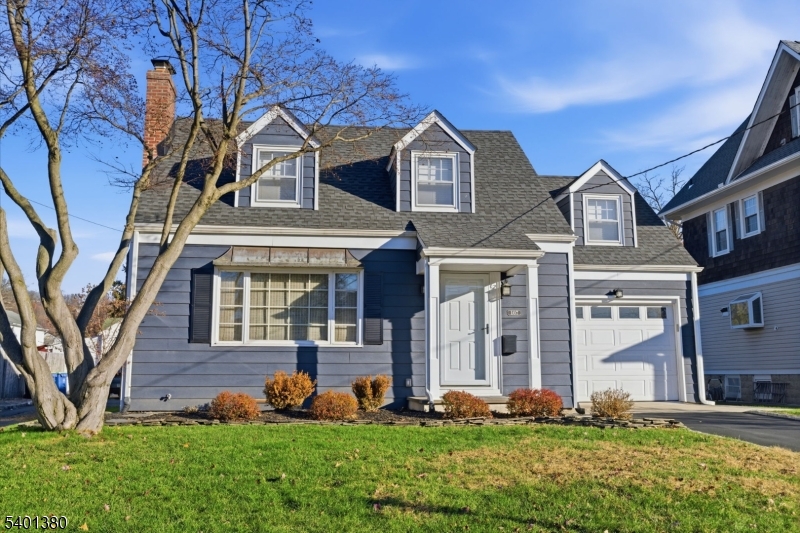 107 Chestnut Street Bound Brook, NJ 08805 - Photo 2 of 24 front view of a house with a yard