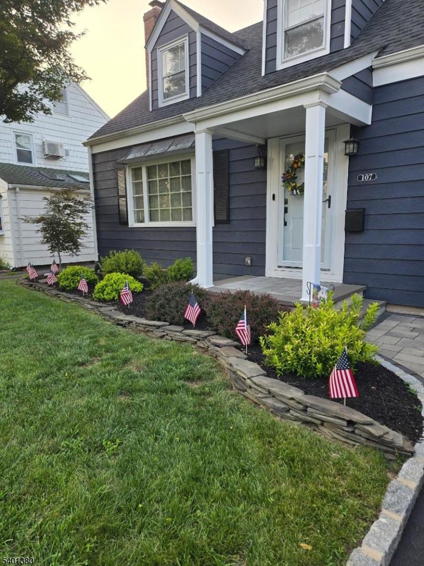 107 Chestnut Street Bound Brook, NJ 08805 - Photo 22 of 24 front view of a house and a yard