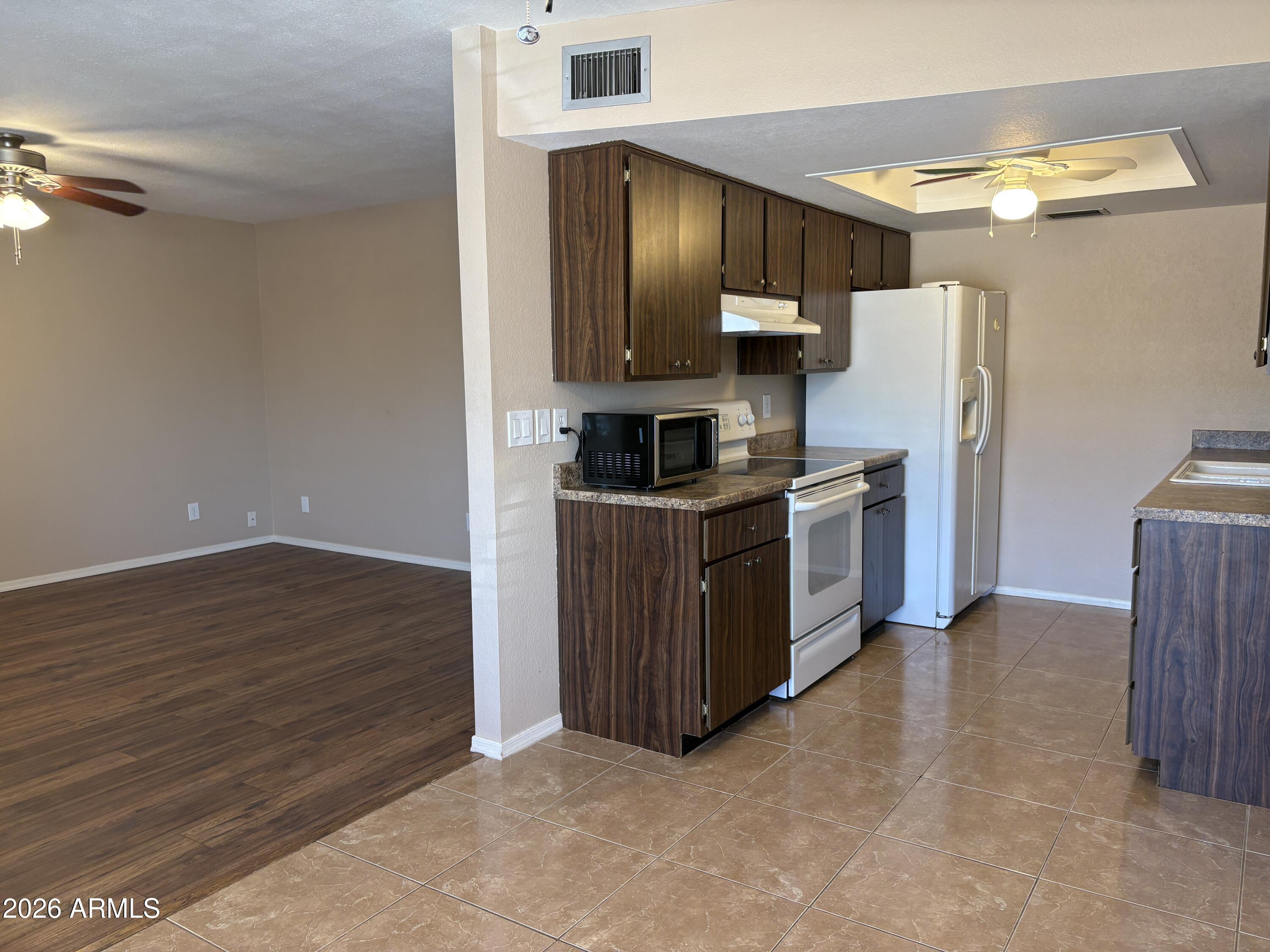 9626 West Mountain View Road, Unit A Peoria, AZ 85345 - Photo 7 of 28 kitchen