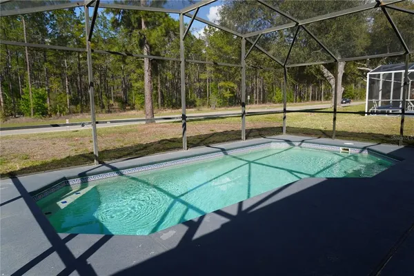 a view of a backyard of a house