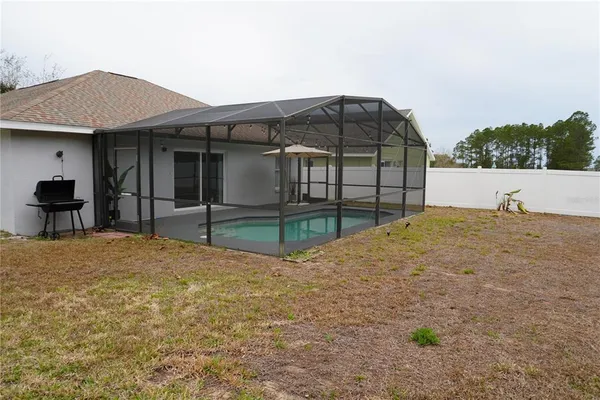 a house view with a outdoor space